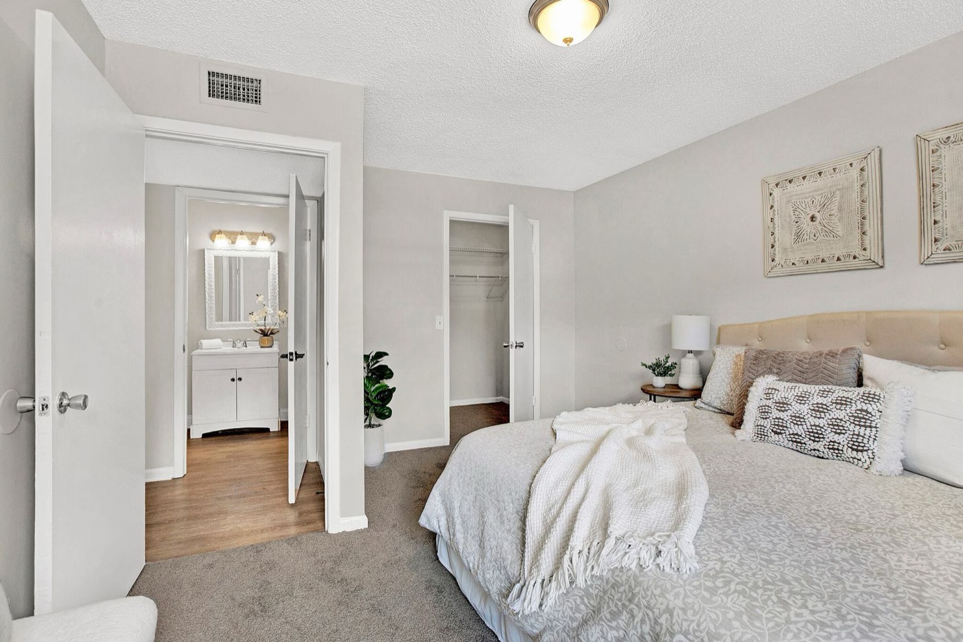 Staged bedroom in a two-bedroom Haven at Parkside apartment