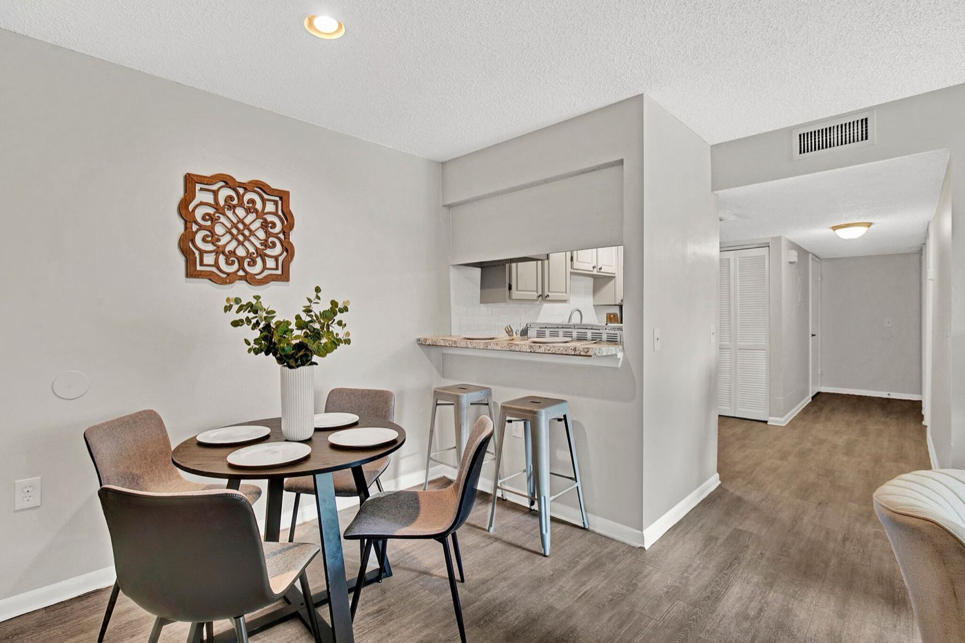 Dining area with modern finishes inside a Haven at Parkside apartment