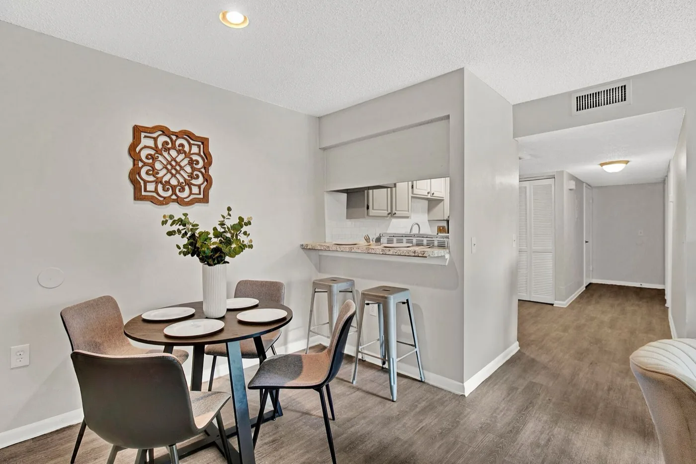 Dining area with modern finishes inside a Haven at Parkside apartment