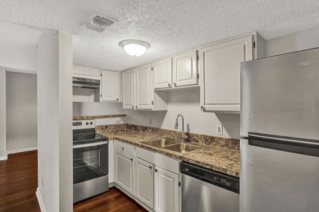 Kitchen with granite-look counters